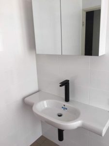 A picture of a bathroom new basin sink that was installed by us