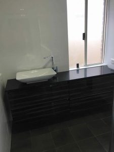 A bathroom makerover with a new sink we installed