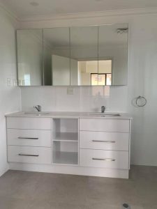 A bathroom vanity that was installed